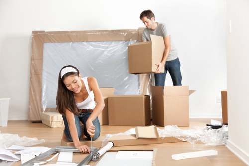 Professional removals team preparing a move in a Maida Vale residential street