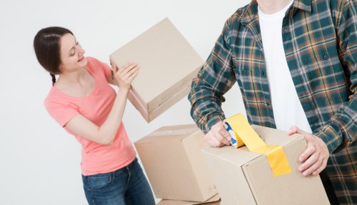 Loading furniture into a van for a Maida Vale delivery or move