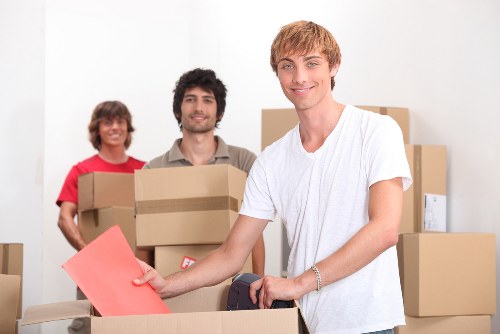 Furniture pick-up and careful loading into a removal van