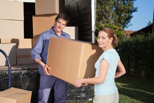 Local removals crew unloading boxes at a Maida Vale property