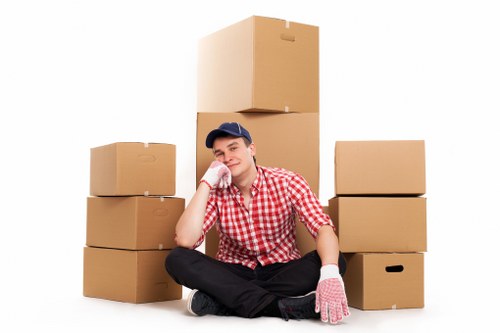 Unpacking boxes in a Maida Vale apartment after relocation